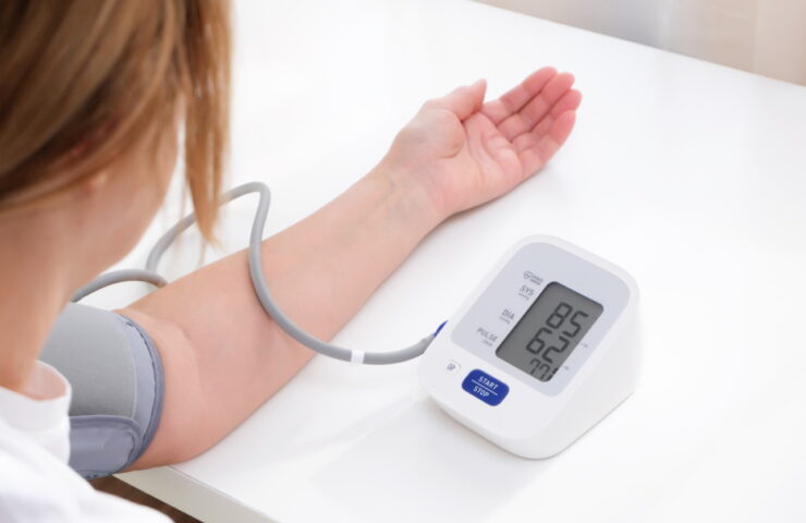 man-measures-blood-pressure-white-background-arterial-hypotension